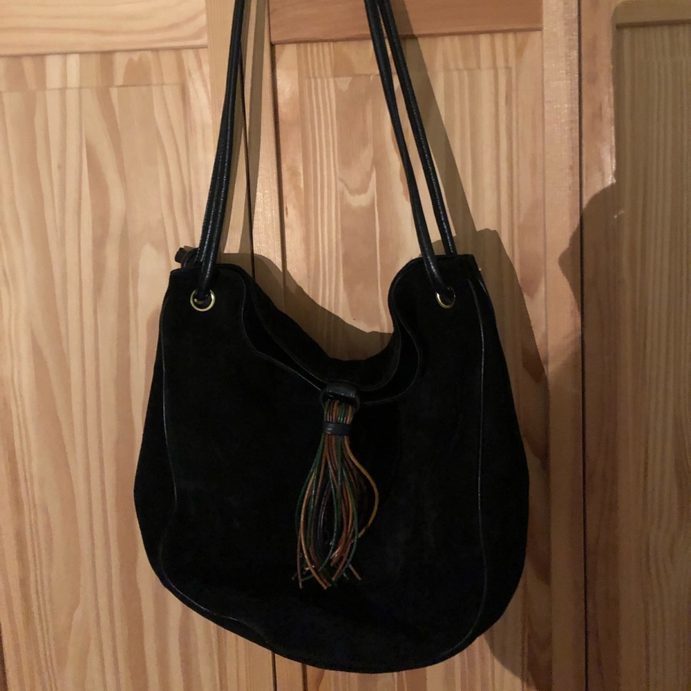 Suede shoulder bag. DESMO is on metal tag inside purse. Like new.